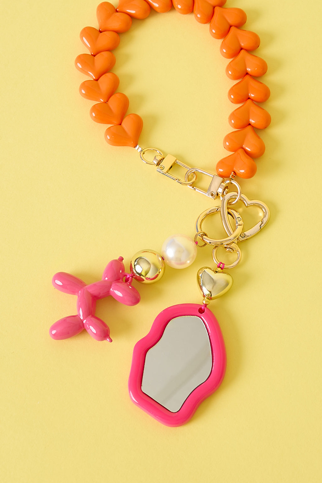 Schattige onregelmatige spiegelende tashanger met hartjesdetail